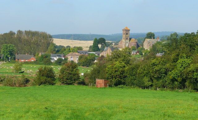 Over the meadows to Hoarwithy The Italianate church of St Catherine dominates the view. The Wye passes unseen between the camera and the village, all within the gridsquare.