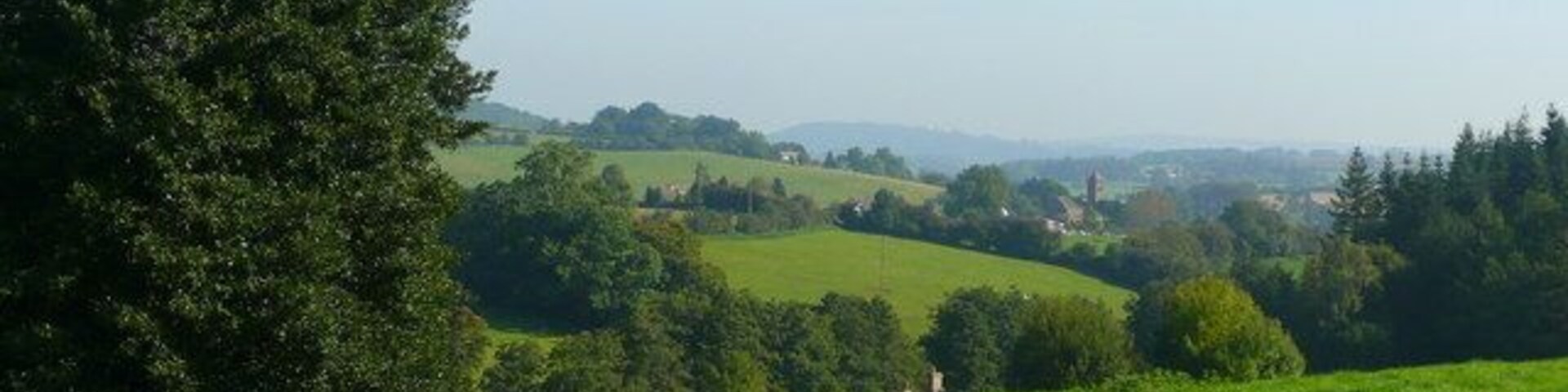 View to Hoarwithy Looking north-east from the pasture above Redbrook Farm with Hoarwithy's distinctive parish church tower in the distance.