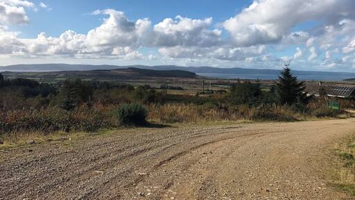 Utterly clear skies on the forest track looking across to the mainland, Mull of Kintyre.