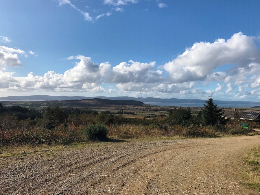 Utterly clear skies on the forest track looking across to the mainland, Mull of Kintyre.