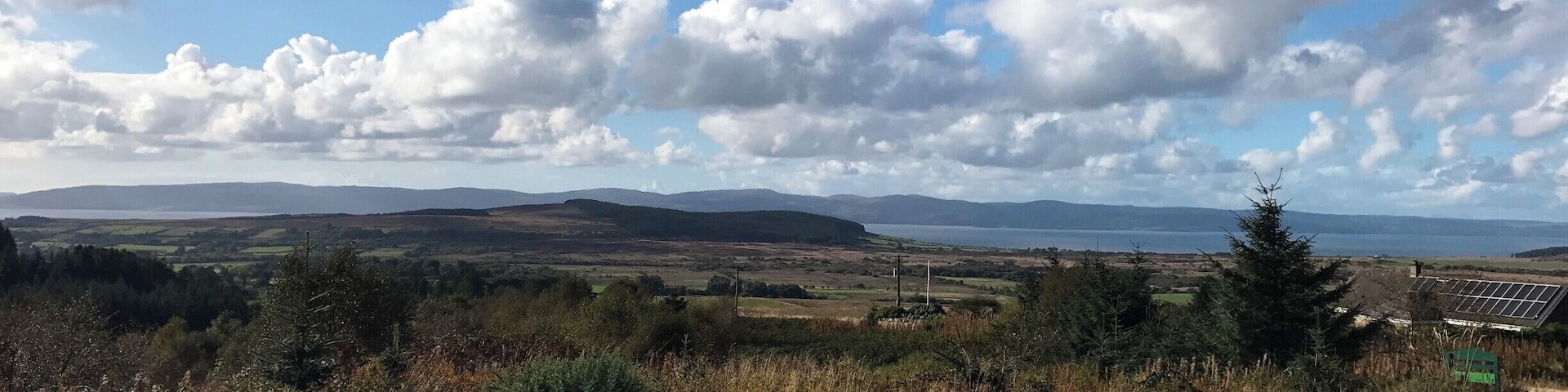 Utterly clear skies on the forest track looking across to the mainland, Mull of Kintyre.