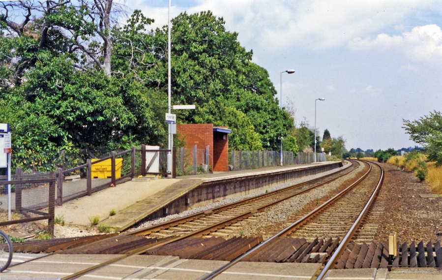 Hykeham station, Lincoln platform 1995. View eastwards, towards Lincoln: ex-Midland Nottingham - Newark Lincoln line. The westbound platform is behind, on the other side of the level-crossing
