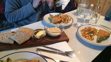 We stumbled upon this little café on our way to Ísafjörður from Patreksfjörður, and what a find! This was probably the best meal I've ever had in Iceland. We each had coffee, freshly-made quiche, chickpea salad, and garlicky hummus with fresh-baked bread. We also shared soup made with coriander and freshly-caught fish, and a piece of carrot cake. Filling and delicious, this fantastic meal cost a very reasonable ISK 3,300 ($29 USD) per person. #TroverDetour