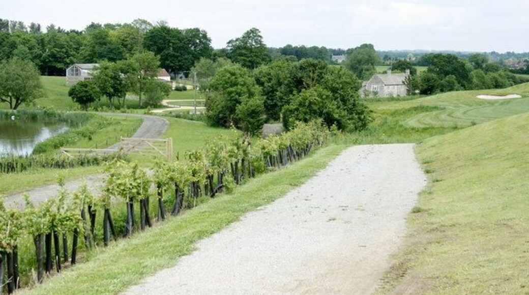 The Macmillan Way in Cumberwell Park The Macmillan Way follows a track which has been made up as a service road for the Cumberwell Park Golf Course. Cherry Orchard Farm is seen with Lower Wraxall just visible.