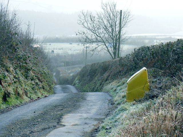 The road down from Esgair Steep and uneven, this narrow lane certainly warrants the visible grit bin.