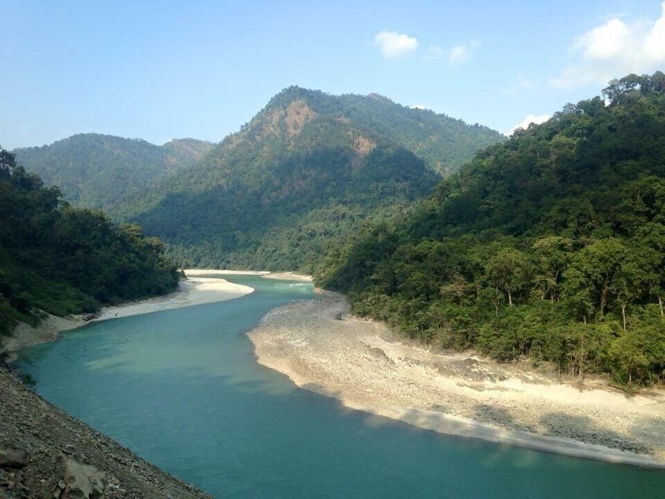 The beautiful teesta river which kept following us in West Bengal region .