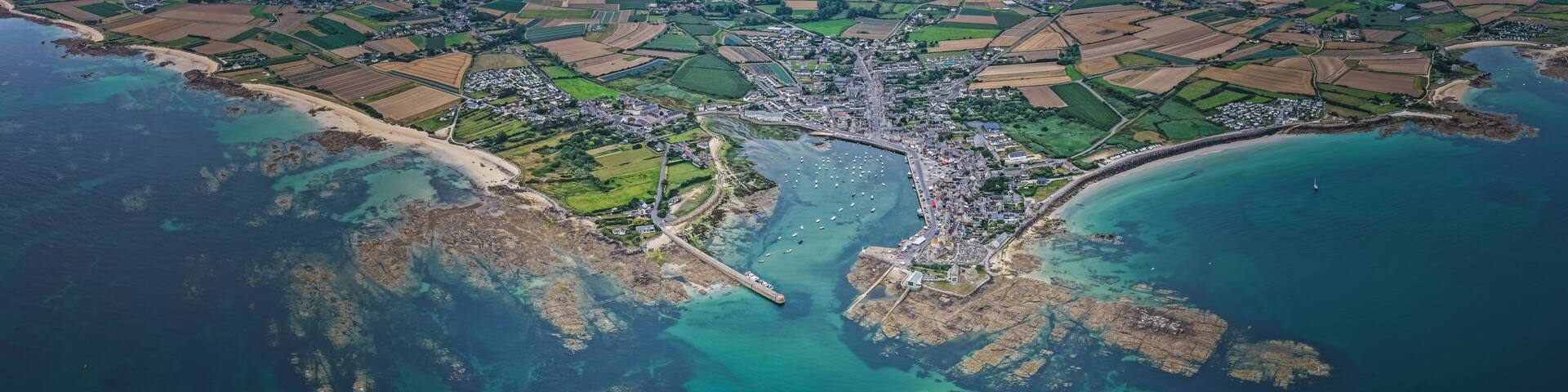 Aerial view of the Village of Barfleur in Normandy and the beautiful coastline of the Cotentin Peninsula