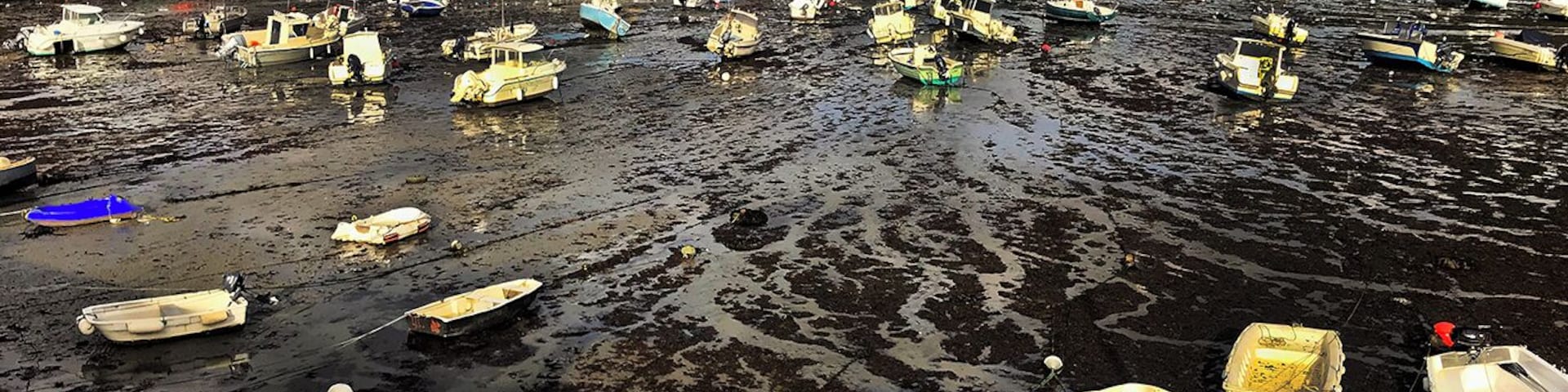 In Normandy, on the English Channel, Barfleur is a gentle sea town with dramatic tides.
1066: A large medallion fixed to a rock in the harbour marks the Normans' departure from Barfleur before the battle of Hastings