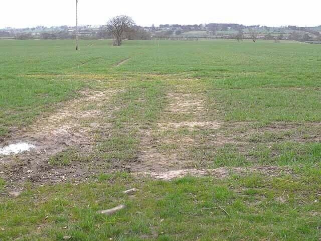 Field near Ogle The village of Whalton can be seen in the distance.
