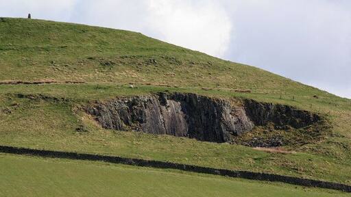 Southdean Law Quarry on the side of Southdean Law.