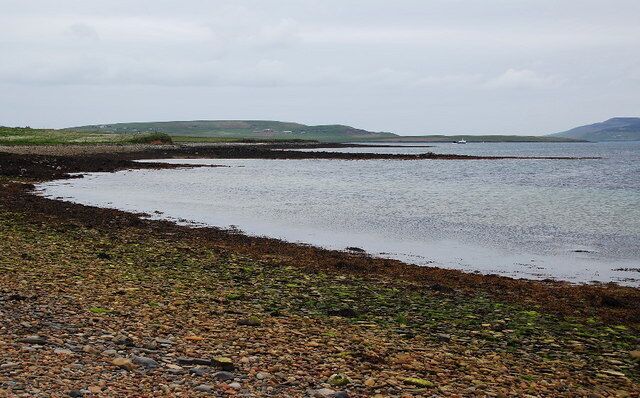 Wass Wick and Salta Taing Good Norse names. Salta Taing is the prominent tongue sticking out into the sea. The ferry from Rousay to Tingwall can just be spotted.