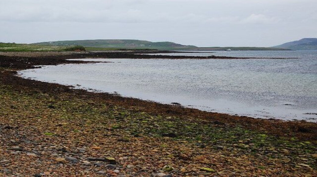 Wass Wick and Salta Taing Good Norse names. Salta Taing is the prominent tongue sticking out into the sea. The ferry from Rousay to Tingwall can just be spotted.