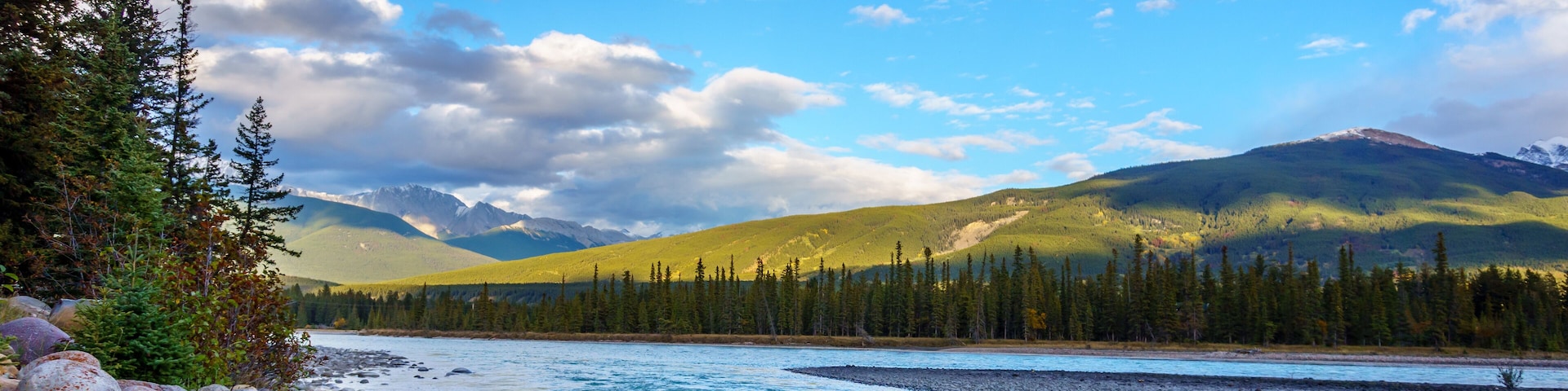 Sunrise over the mountains around the town of Jasper in the Canadian Rocky Mountains on a nice September morning