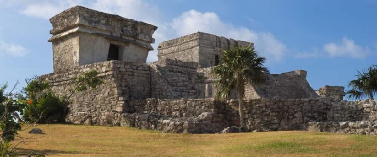Ancient stone ruins with a clear sky.