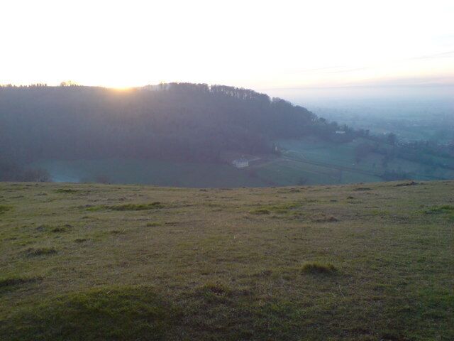Pen Hill from Selsley Common at sundown Lovely misty view of Pen Hill woods with the Severn Valley beyond.