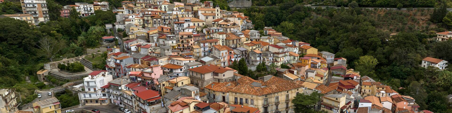 Aerial panoramic view of the historic center of the town of Lamezia Terme, in the province of Catanzaro, Calabria, Italy. These are the old houses of the Nicastro district, perched on the hill.