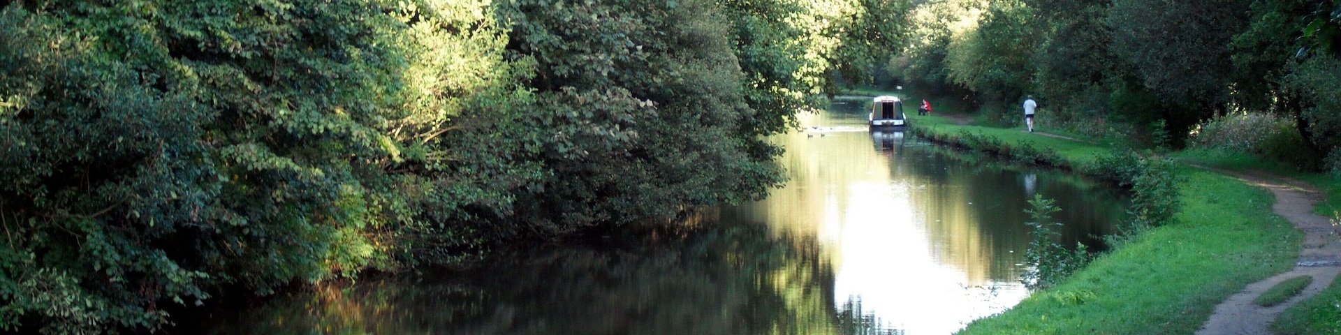 Canal and towpath. The Leeds and Liverpool canal just to the east of Bridge no.40