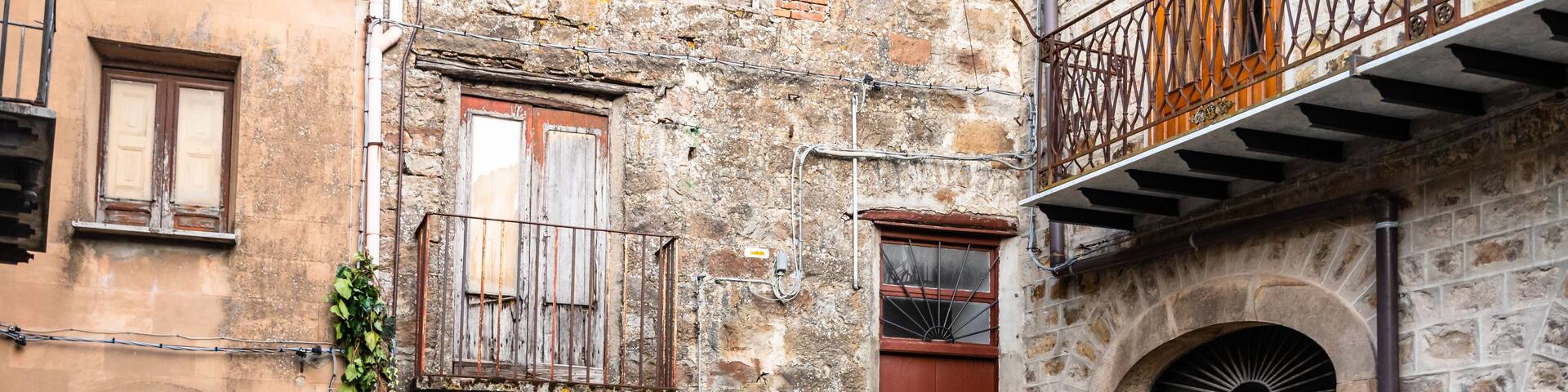 Rural houses and narrow streets in the medieval village Geraci Siculo, Italy