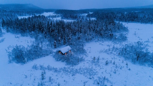 Small cottage in snow