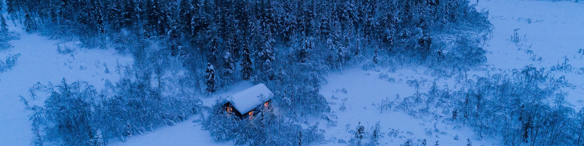 Small cottage in snow