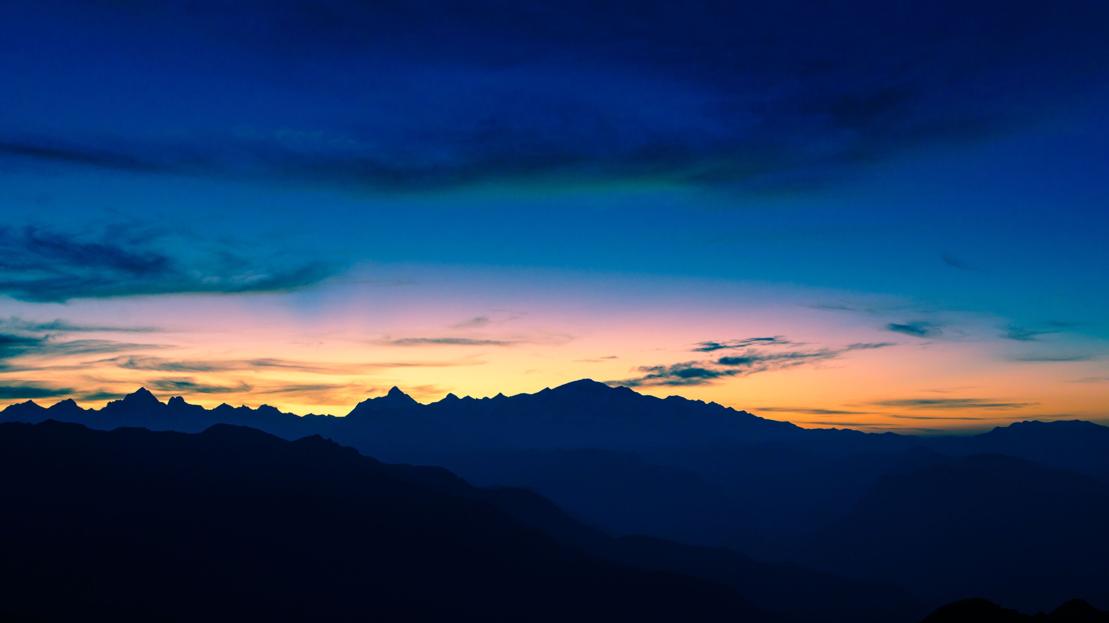 Beautiful panoramic landscape view of the sunrise of Himalayan snow mountains from Chandrashila peak in Chopta, Uttarakhand, India,.