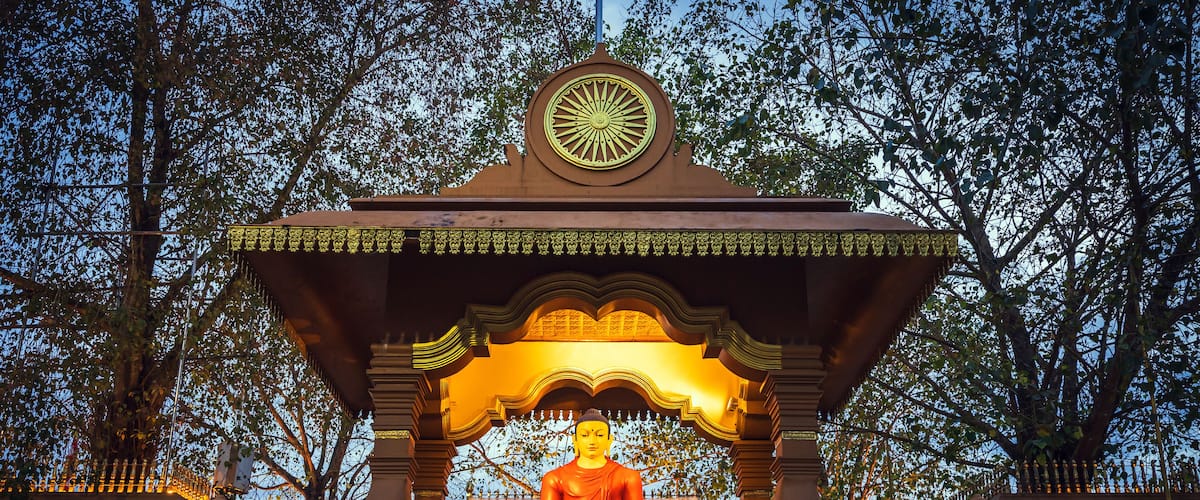 Buddha statue at the entrance to Kaduwela Mahamevnawa Buddhist Monastery