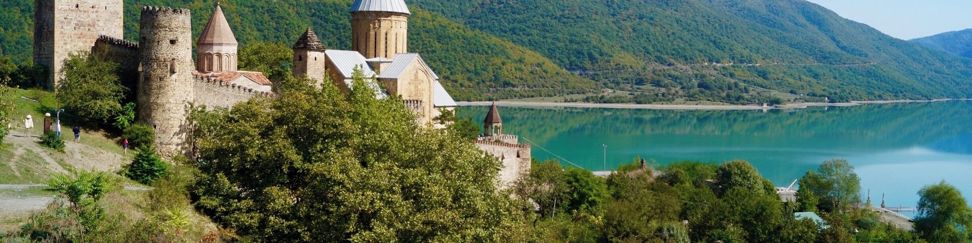 The Ananuri fortress set beautifully above the Zhinvali reservoir. Visit on your way from Tbilisi to Kazbegi!