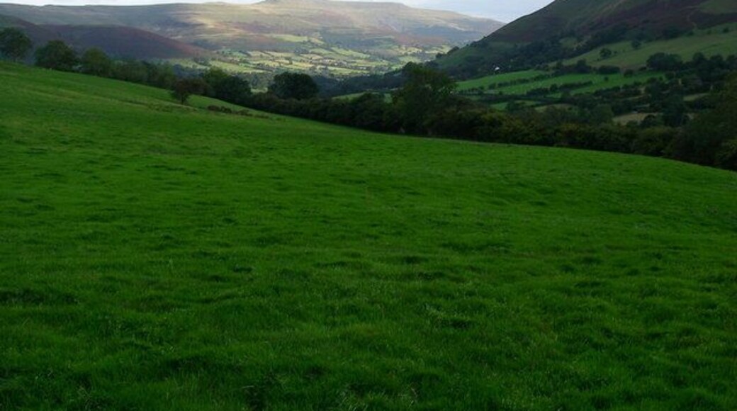 How green, the valley of the Rhiangoll. The southernmost spur of the main Black Mountains massif, Pen Allt-mawr is bathed in sunlight in the distant view.