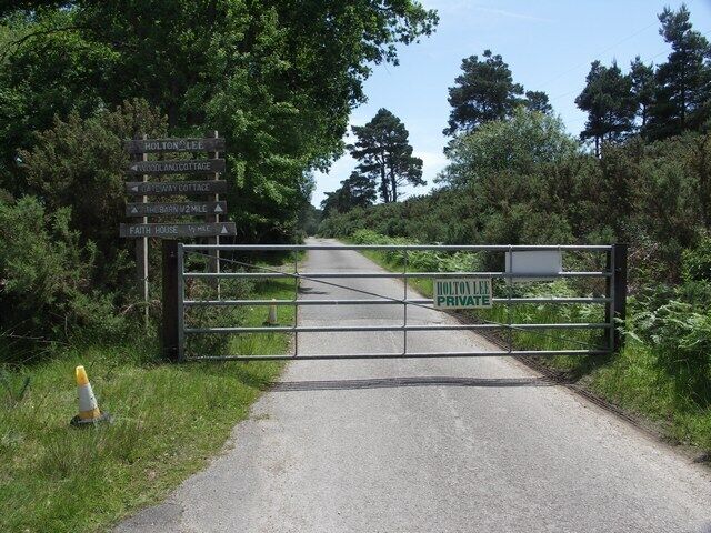 Entrance to Holton Lee This gate, and the word "Private" seem to deny access to the heath. However, on the other side there is a welcome display board and free leaflets about the Holton Lee Nature Reserve. So long as you are on foot, ignore the sign and go on. All quite strange. See the Holton Lee web site. http://www.holtonlee.co.uk