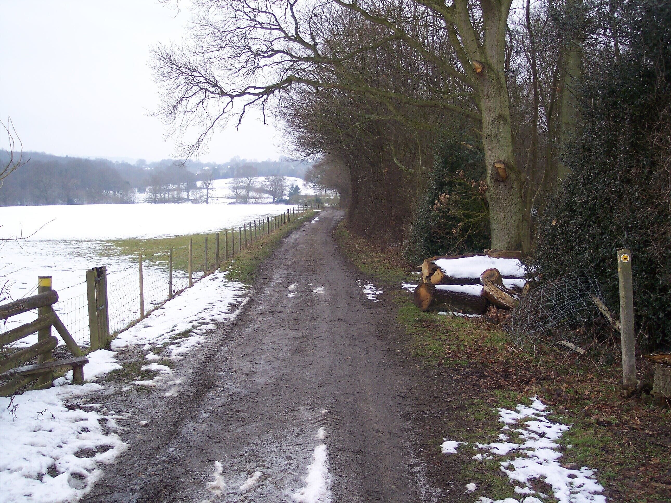 Footpath junction on High Weald Landscape Trail (2) A footpath No.WC328 from Benenden Road, heads straight on towards Iden Green. The long distance path heads left towards Strawberry Wood and then onto Rolvenden.