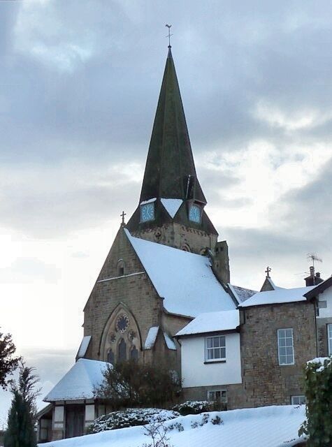 All Saints Church, Burton in Lonsdale Quite a large church, perhaps because of the former importance of the village for silk and wool weaving. It was built in an impressive position by Paley in 1868-76. The tower with spire is on the south side of the nave. The chancel looks to be taller than the nave.