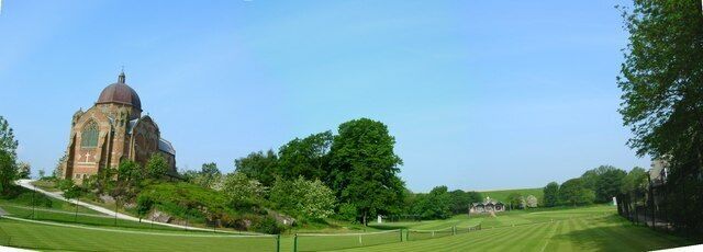 Giggleswick School Chapel and Top Pitch. Four grass tennis courts and "top pitch" (with cricket pavilion) make a wonderful setting for the school chapel (a gift of Walter Morrison of Malham) completed in 1901.