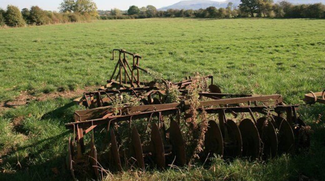 Rusty disc harrow, field, Carr Hill, near to Potto, North Yorkshire, Great Britain.