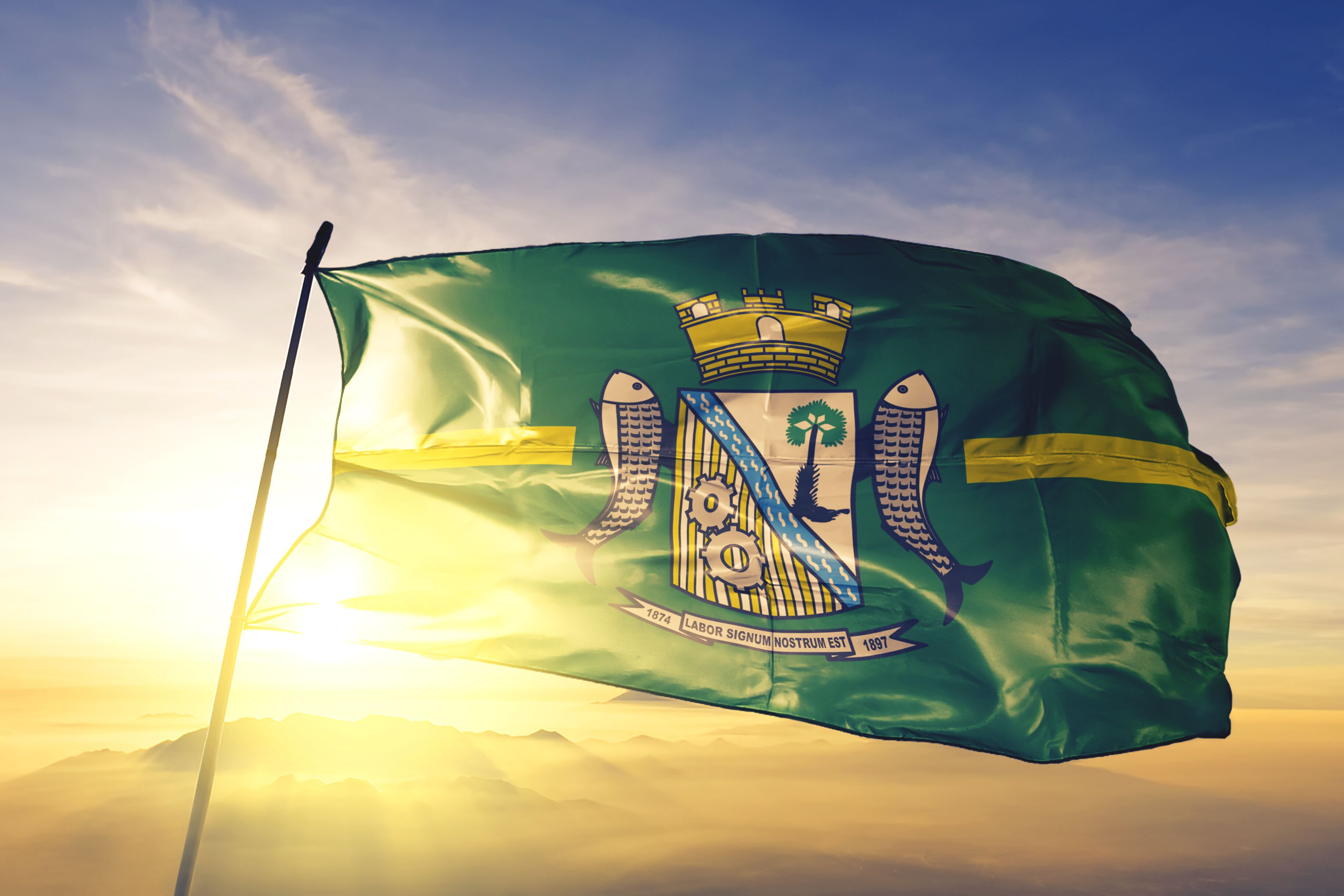 Floriano of Brazil flag waving on the top sunrise mist fog