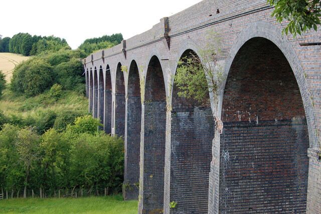 Looking north at the west side of Catesby viaduct. The twelve arches of this lofty blue-brick viaduct carried the now-dismantled Great Central Railway mainline over the infant River Leam. The ex-GCR line from Nottingham to London Marylebone opened in 1899 and closed in 1966.