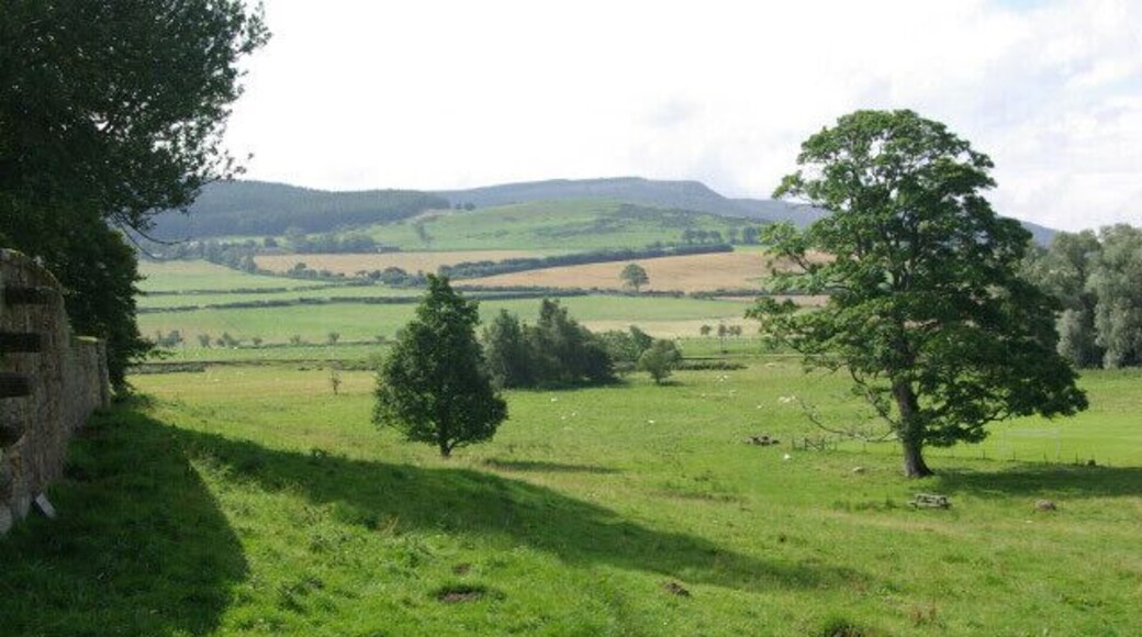 Coquetdale from Wreighburn House From Wreighburn House the land falls away to the River Coquet. In the distance are the Simonside Hills.
