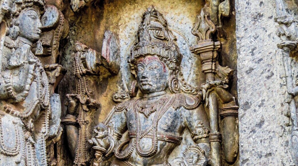 Beautiful figure carved in soapstone in Hoysaleswara Temple, Halebeedu, India.