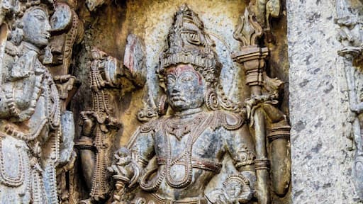 Beautiful figure carved in soapstone in Hoysaleswara Temple, Halebeedu, India.