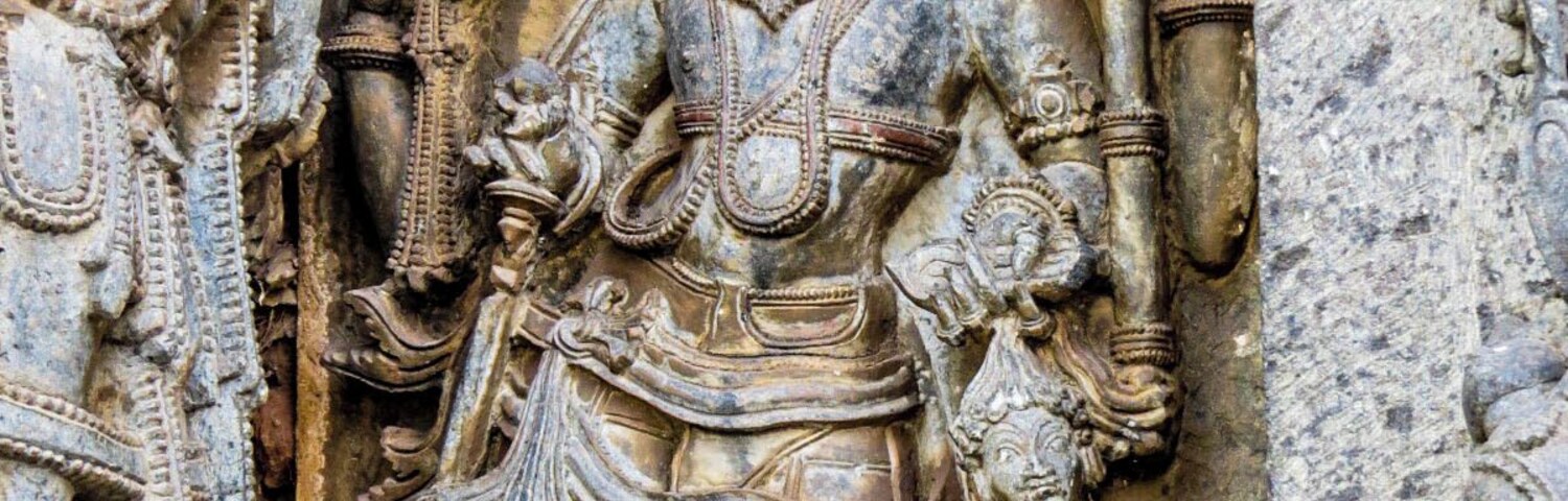Beautiful figure carved in soapstone in Hoysaleswara Temple, Halebeedu, India.