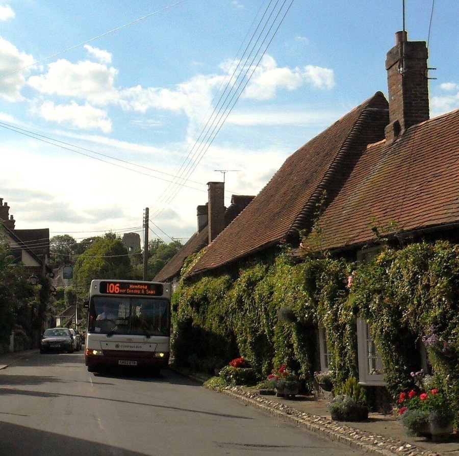 Compass Travel bus in The Street, Bramber. The service 106 plies its trade between Worthing and Henfield.