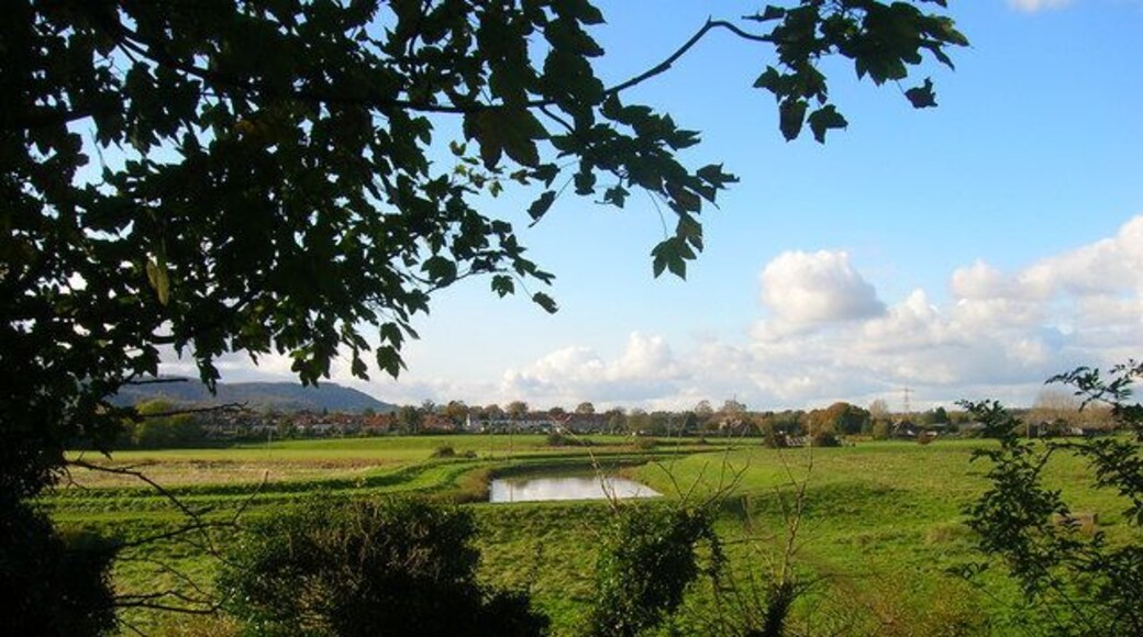 River Adur Taken from the steps that lead down from Church Lane to the river, the footbridge over a drainage ditch can be seen bottom right. Over the far side of the river is the outer suburbs of Steyning.