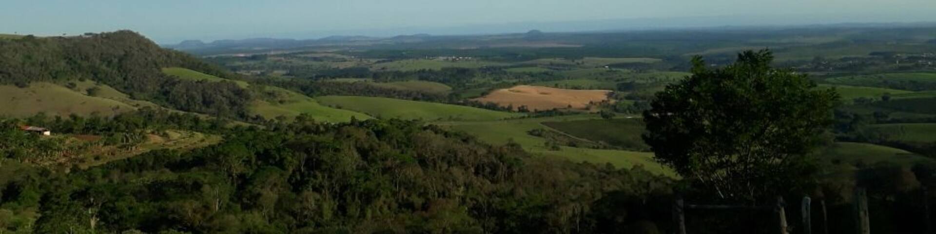 A hilly landscape with a clear sky.