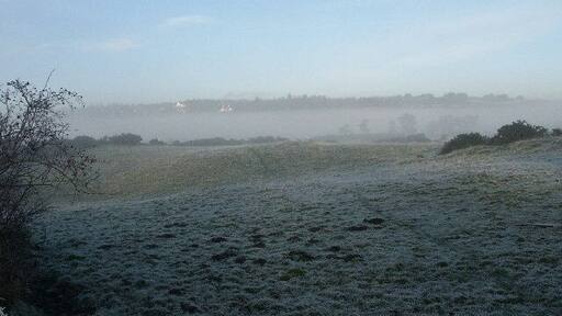 Craigends looking toward Knapps over the Loch. Taken from a car park on Bridge of Weir Road. Over the frosty misty fields toward Knapps on the hill (Kilmacolm) and Knapps Loch under the mist. Early afternoon Christmas day.