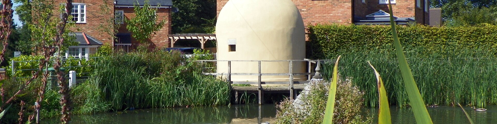 The cage on the pond, Shenley, Hertfordshire (Grade II). 18th century village lock-up. 6 September 2015.
