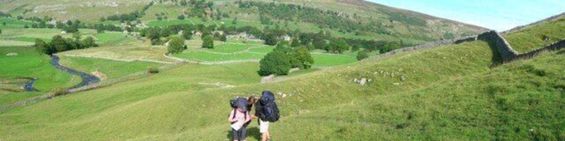 Yorkshire Dales navigation. On the way to Malham on the Monks Road, or are we? Duke of Edinburgh Silver Award students (from Giggleswick School) study the map on their way out of Arncliffe as they head towards Malham Tarn. The route follows the deep sided Cowside Beck...magnificent Limestone Country.