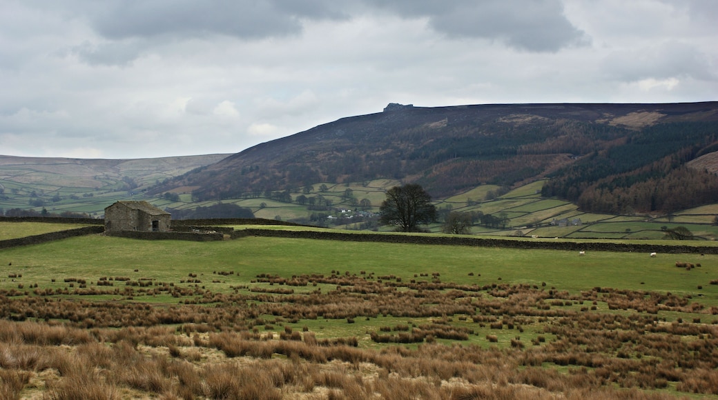 An old barn at High Laithe with Simon's Seat beyond