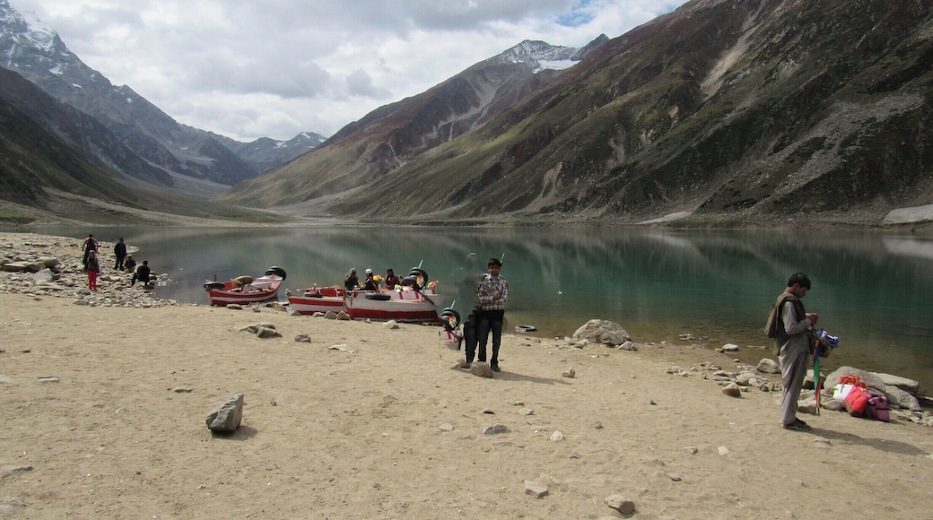 Nearly 8km from Naran and situated at the height of 10,578 feet (3,224 meters) above sea level, Saiful Muluk is the most beautiful lake in the Kaghan Valley. Offering splendid views of the Peak of Malika Parbat (Mountain) this lake is a water source for River Kunhar.
We visited Saiful Muluk on 16th September 2015, the pleasant smell and the pollution free environment, make us feel that we are in some other world. The weather is sort of undefinable as the wind is cold and the areas where there are clouds and shade it feels very cold but at the area where the sun is shining it feels too hot. The water of the lake was cold, but we all were enjoying it very much. The water is too clear and reflection of nearby mountain seen in the lake is amazing, it feels like a huge mirror lying on the ground.
http://karachitokhunjerab.blogspot.com/