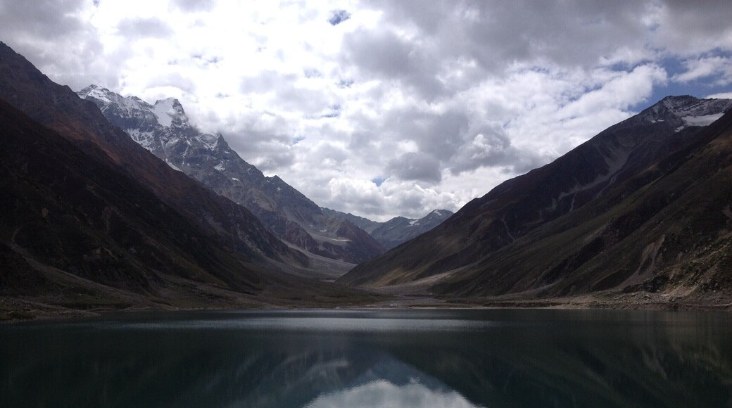 Nearly 8km from Naran and situated at the height of 10,578 feet (3,224 meters) above sea level, Saiful Muluk is the most beautiful lake in the Kaghan Valley. Offering splendid views of the Peak of Malika Parbat (Mountain) this lake is a water source for River Kunhar.
We visited Saiful Muluk on 16th September 2015, the pleasant smell and the pollution free environment, make us feel that we are in some other world. The weather is sort of undefinable as the wind is cold and the areas where there are clouds and shade it feels very cold but at the area where the sun is shining it feels too hot. The water of the lake was cold, but we all were enjoying it very much. The water is too clear and reflection of nearby mountain seen in the lake is amazing, it feels like a huge mirror lying on the ground.
http://karachitokhunjerab.blogspot.com/
