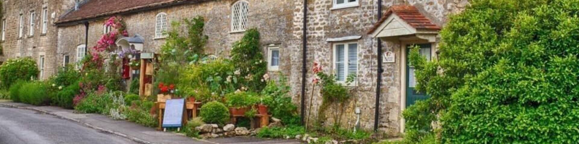 Row of houses in Mells.
Mells is a village and civil parish in Somerset, England, near the town of Frome.