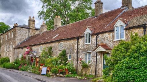 Row of houses in Mells.
Mells is a village and civil parish in Somerset, England, near the town of Frome.